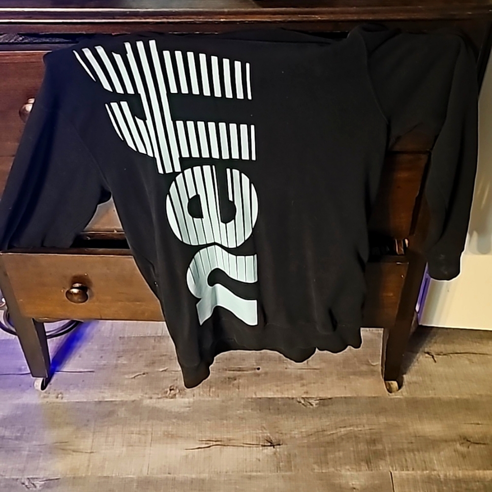 Neff Sweater size small fits like a large